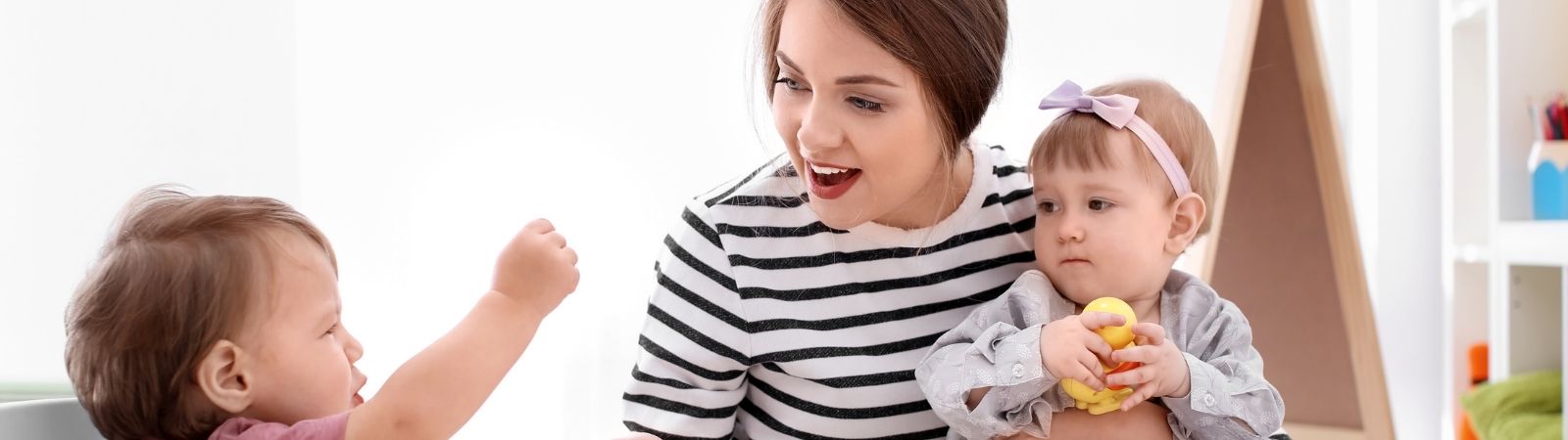 A babysitter with two young children