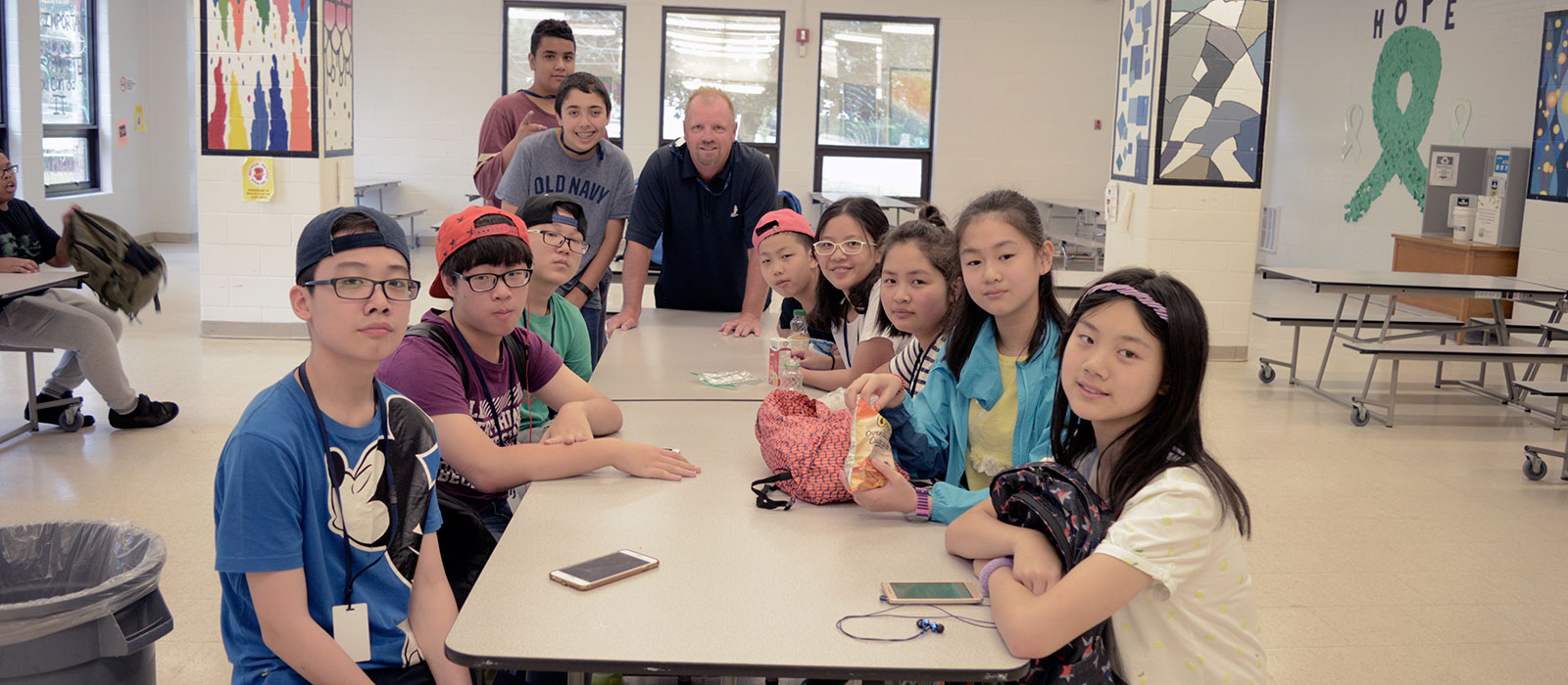 A group of international students posing for a photo.