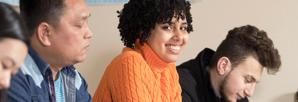 student smiling at camera